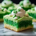 Shamrock Shake Sugar Cookie Bars with green frosting and sprinkles