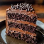 Delicious triple chocolate cake with layers of rich chocolate frosting and decoration.