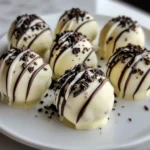 Delicious white chocolate mint Oreo truffles on a decorative plate