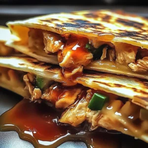 Hot Honey Chicken Quesadillas served on a plate with garnishes
