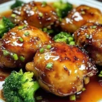 Sheet Pan Honey Garlic Chicken served with vegetables on a dinner plate