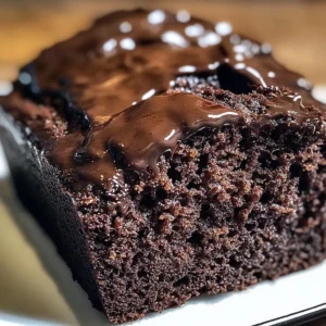 Chocolate Espresso Banana Bread loaf with chocolate chips and banana slices