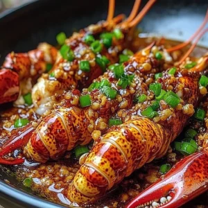 Delicious Garlic and Ginger Asian Lobster served on a plate