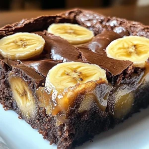 Delicious banana pudding brownies topped with creamy banana and vanilla layers