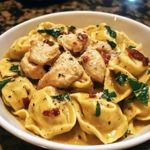 Delicious Marry Me Chicken Tortellini dish served with fresh basil and parmesan.
