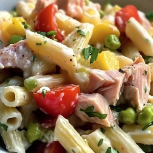 Delicious Tuna Pasta Salad with vibrant vegetables and herbs