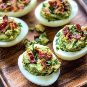 Bacon Guacamole Deviled Eggs served on a platter
