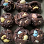 Delicious Cadbury Egg Cookies fresh out of the oven with chocolate filling