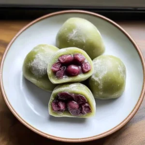 Delicious Matcha Mochi with Red Beans garnished with sweet toppings