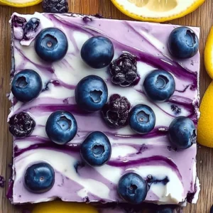 Delicious homemade blueberry lemon yogurt bark with fresh berries.