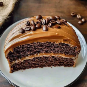 Delicious slice of espresso cake with an enticing filling and rich coffee flavor.